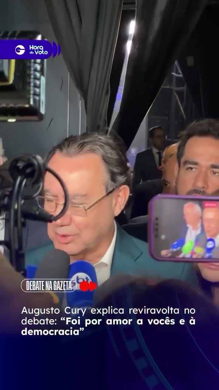 Augusto Cury fala com jornalistas nos bastidores do debate político